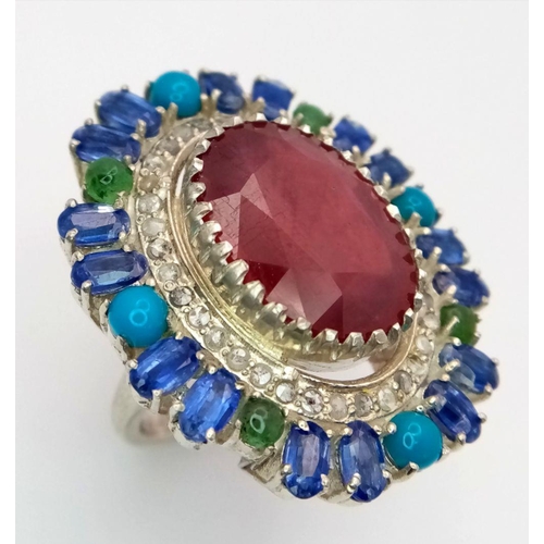 304 - A 925 silver ring with a 15ct central ruby, accented by 12ct opals and 1.50ct diamonds. Ring size O.... 