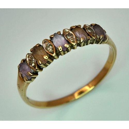 367 - A 9K GOLD RING WITH AMETHYST AND DIAMONDS .      1.5gms    size P