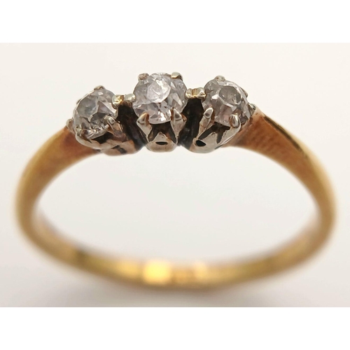 390 - A 18K yellow gold diamond trilogy ring, 0.24ct diamond weight, 2.2g total weight, size N 1/2. Ref SH... 