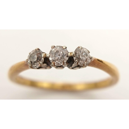 390 - A 18K yellow gold diamond trilogy ring, 0.24ct diamond weight, 2.2g total weight, size N 1/2. Ref SH... 