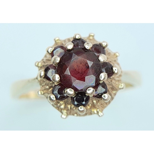 582 - Impressive 9 carat GOLD GARNET SOLITAIRE RING. Having a large ( 2 carat) Deep Red GARNET set to top ... 