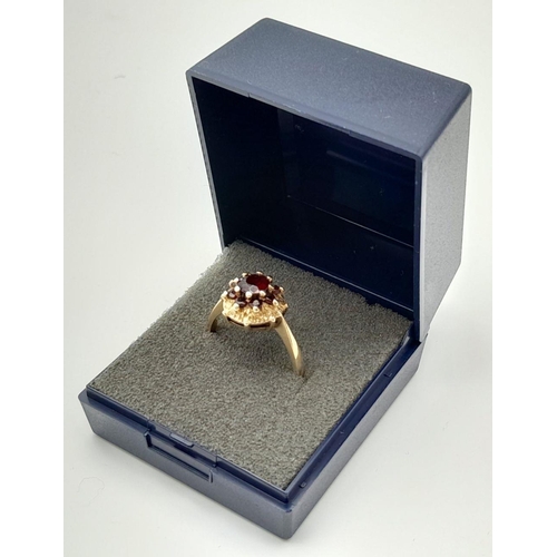 582 - Impressive 9 carat GOLD GARNET SOLITAIRE RING. Having a large ( 2 carat) Deep Red GARNET set to top ... 