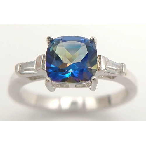 852 - A Sterling Silver Blue and White Sapphire Ring Size P. Set with a 6mm Cushion Cut Square Blue Sapphi... 