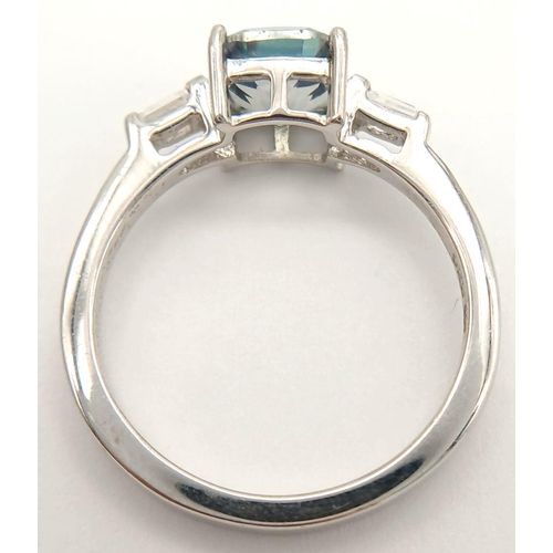 852 - A Sterling Silver Blue and White Sapphire Ring Size P. Set with a 6mm Cushion Cut Square Blue Sapphi... 