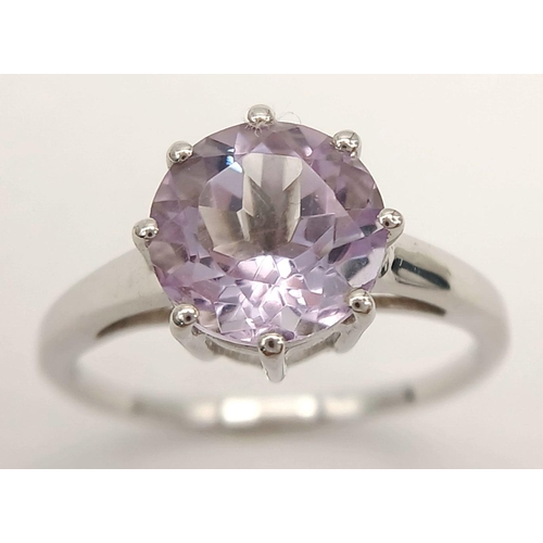 866 - A Sterling Silver 9mm Round Cut Amethyst Solitaire Ring Size Q. Gross Weight 2.53 Grams