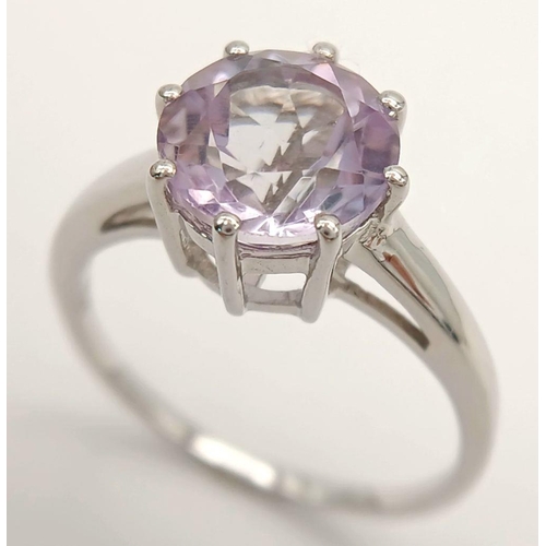 866 - A Sterling Silver 9mm Round Cut Amethyst Solitaire Ring Size Q. Gross Weight 2.53 Grams