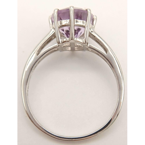 866 - A Sterling Silver 9mm Round Cut Amethyst Solitaire Ring Size Q. Gross Weight 2.53 Grams