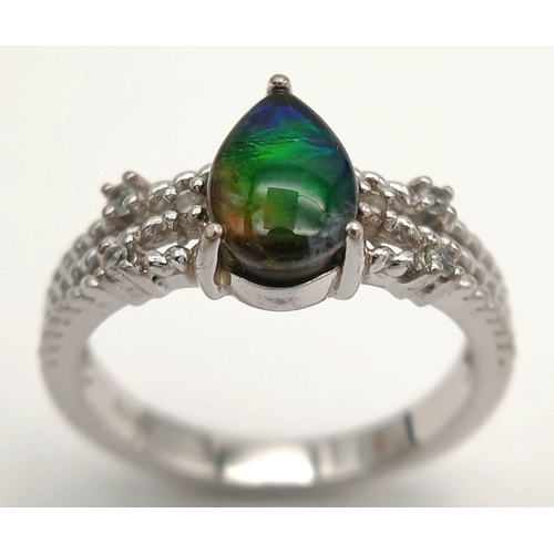 956 - An Impressive Sterling Silver Pear Cut Ammolite and White Sapphire Set Ring Size N1/2. The Ring is s... 