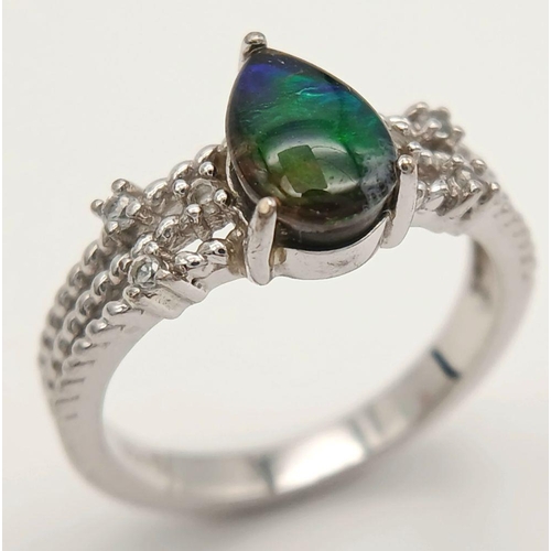 956 - An Impressive Sterling Silver Pear Cut Ammolite and White Sapphire Set Ring Size N1/2. The Ring is s... 