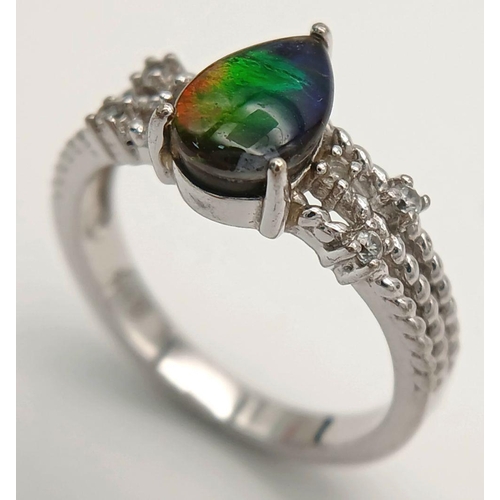 956 - An Impressive Sterling Silver Pear Cut Ammolite and White Sapphire Set Ring Size N1/2. The Ring is s... 