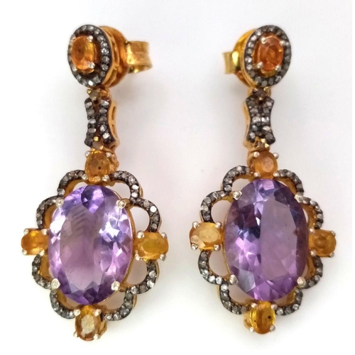 969 - A pair of 925 silver dangler earrings set with semi-precious gemstones and diamonds. Gemstone approx... 