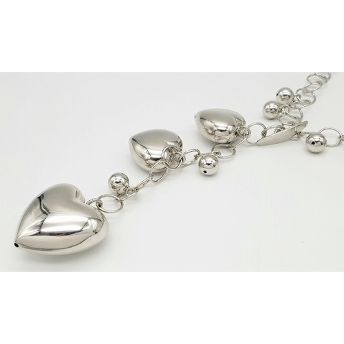 648 - A STERLING SILVER MULTI HEART LARRIOT NECKLACE 38.5G. Ref: H 5005