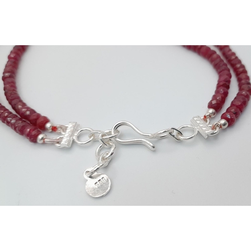 661 - A 925 silver necklace with 215ct faceted ruby gemstones, measuring 3mm-4mm, with a silver clasp. Ref... 