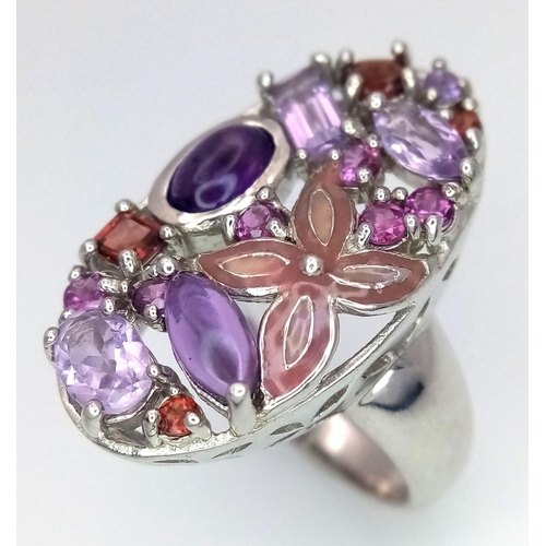 774 - A Sterling Silver, Amethyst and Garnet Set Statement Ring Size S. The Ring Measures 3cm Long at the ... 