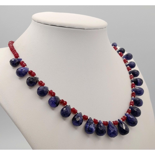 976 - A 925 silver necklace with 185ct ruby gemstones and sapphire drops. Ref: CD - 1552.