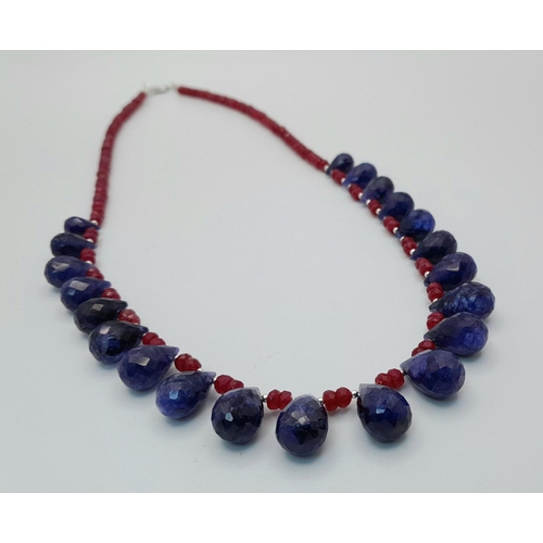 976 - A 925 silver necklace with 185ct ruby gemstones and sapphire drops. Ref: CD - 1552.