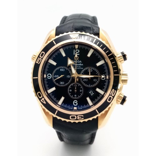 339 - An 18K Gold Omega Planet Ocean 600 Chronograph Automatic Gents Watch. Black leather/silicone strap w... 