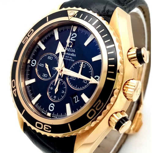 339 - An 18K Gold Omega Planet Ocean 600 Chronograph Automatic Gents Watch. Black leather/silicone strap w... 