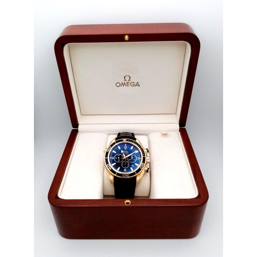 339 - An 18K Gold Omega Planet Ocean 600 Chronograph Automatic Gents Watch. Black leather/silicone strap w... 