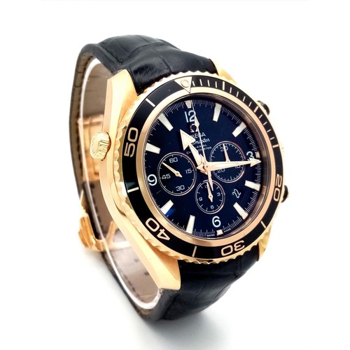 339 - An 18K Gold Omega Planet Ocean 600 Chronograph Automatic Gents Watch. Black leather/silicone strap w... 