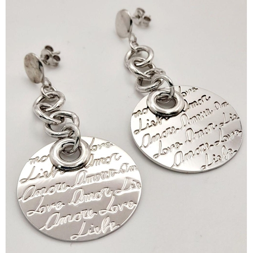 1066 - A STERLING SILVER DROP EARRINGS WITH THE WORD LOVE ENGRAVED IN MANY LANGUAGES 10.5G. Ref: H 5004