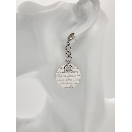 1066 - A STERLING SILVER DROP EARRINGS WITH THE WORD LOVE ENGRAVED IN MANY LANGUAGES 10.5G. Ref: H 5004