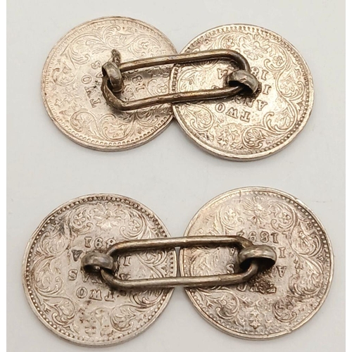 1112 - A Pair of 1895 Dated Two Annas Silver Coin Cufflinks. 1.6cm Diameter Coins. Gross Weight 8.58 Grams.