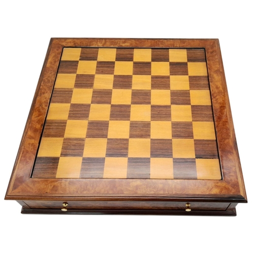 1157 - A SOLID MAPLE WALNUT CHESS BOARD WITH DRAWERS EITHER SIDE AND CARVED WOODEN WEIGHTED CHESS PIECES , ... 