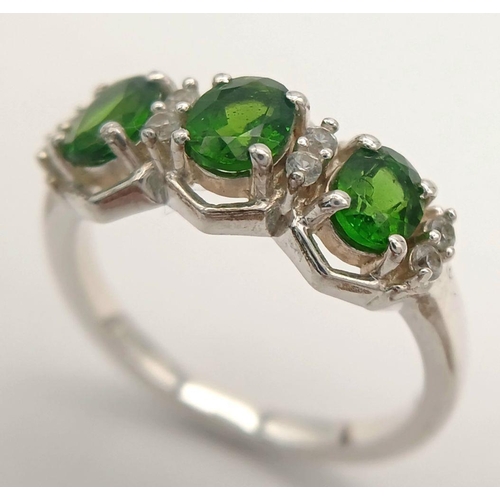 1189 - A Sterling Silver Diopside and White Sapphire Set Ring Size O. Set with Three 6mm Long Oval Cut Gree... 