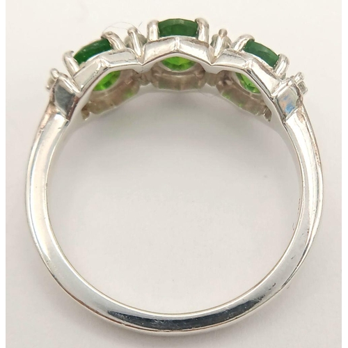 1189 - A Sterling Silver Diopside and White Sapphire Set Ring Size O. Set with Three 6mm Long Oval Cut Gree... 