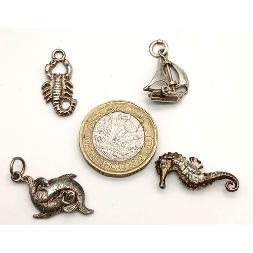 1192 - A 4 X STERLING SILVER WATER THEMED CHARMS CRAB, SAILING BOAT, SEAHORSE & LOVE FISH 8.8G. Ref: H 5014