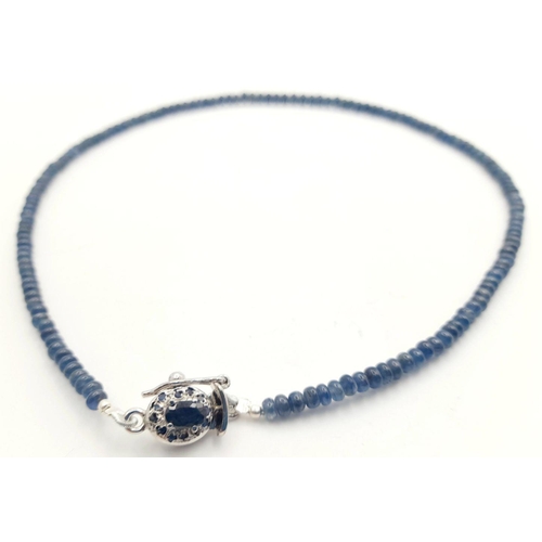 1202 - A 925 silver single strand necklace with 110ct cabochon blue sapphire gemstones and silver clasp. Re... 