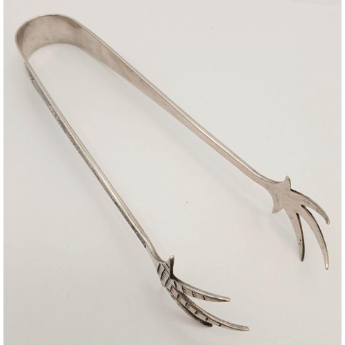 1235 - A stunning sterling silver Eagle claws sugar tons with fabulous engravings. Total weight 28.6G. Tota... 