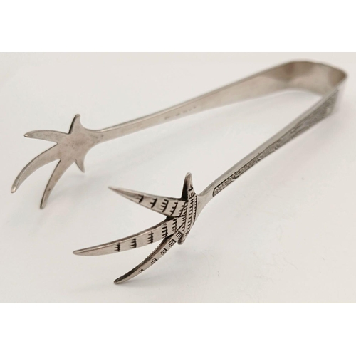 1235 - A stunning sterling silver Eagle claws sugar tons with fabulous engravings. Total weight 28.6G. Tota... 