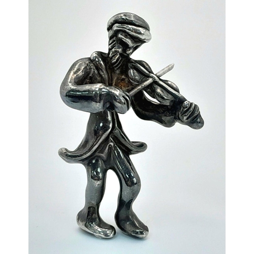 1249 - A vintage 925 silver musician figurine. Total weight 9.4G.