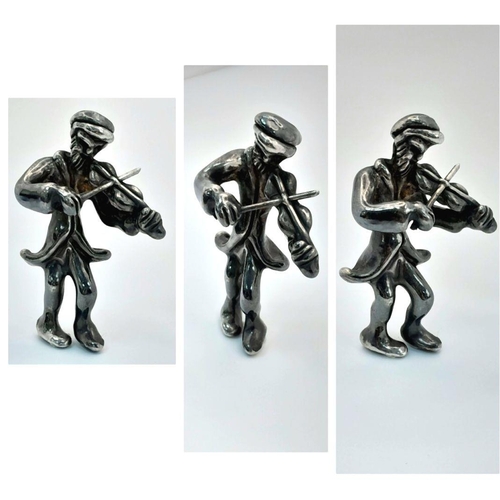 1249 - A vintage 925 silver musician figurine. Total weight 9.4G.