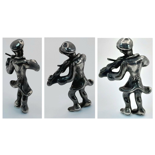 1249 - A vintage 925 silver musician figurine. Total weight 9.4G.