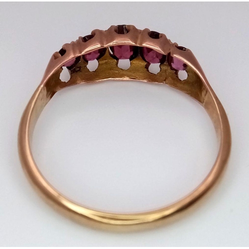 553 - Impressive 9 carat GOLD and GARNET RING. Consisting a sweep of  5 x OVAL CUT GARNETS mounted to top ... 