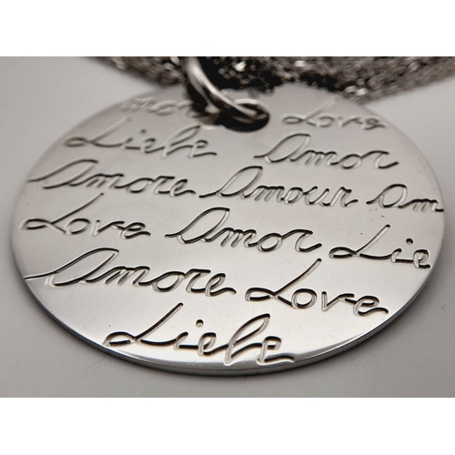 655 - A STERLING SILVER MULTI STRAND NECKLACE WITH PENDANT ENGRAVED WITH THE WORD LOVE IN MANY LANGUAGES 3... 