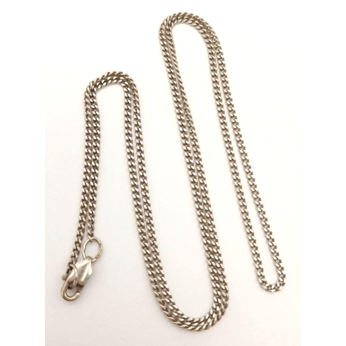 786 - A 9K white gold curb chain. Total weight 3.4G. Total length 47cm.