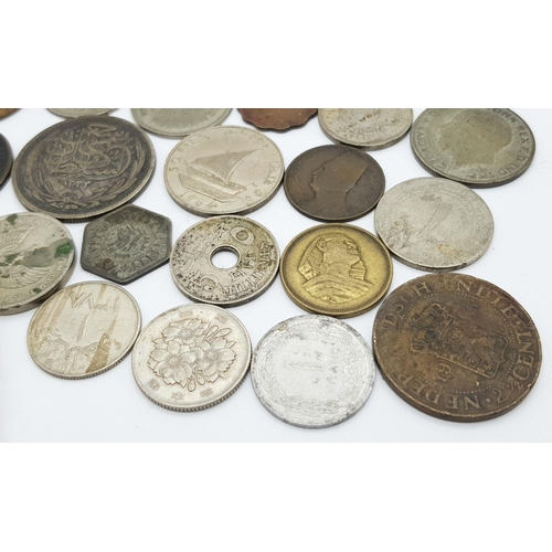 900 - A Small Collection of World Coins - a few silver.