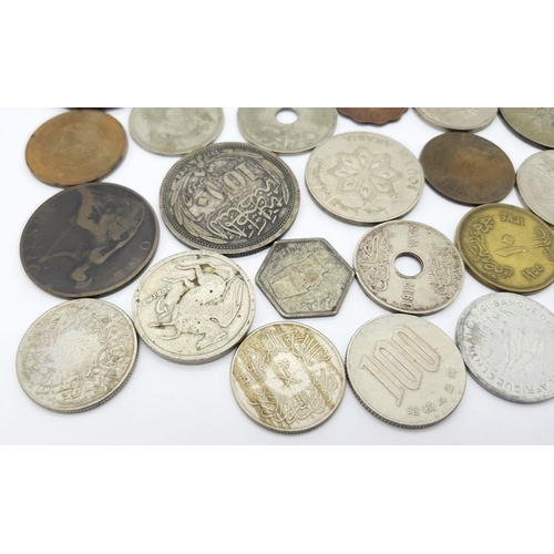 900 - A Small Collection of World Coins - a few silver.