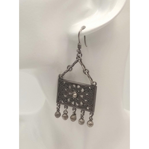 914 - A Pair of Vintage Sterling Silver Decorative Pierced and Ornate Drop Earrings. Book form with hangin... 