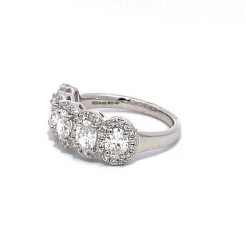 659 - A Platinum 5-stone DIAMOND Ring. 1.28ct claw set oval shaped 5 Diamonds, decorated with further 0.34... 