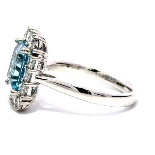 680 - A Platinum AQUA and DIAMOND Cluster Ring. 1.91ct claw set oval shape Aqua centre, decorated with 0.7... 