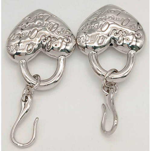 1073 - A STERLING SILVER HEART DROP EARRINGS ENGRAVED WITH THE WORD LOVE IN MANY LANGUAGES 14.8G. Ref: H 50... 