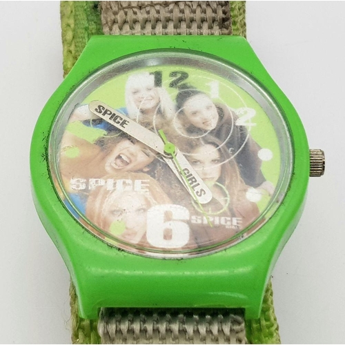 1045 - A SPICE GIRLS GREEN CASED WATCH WITH ORIGINAL MILITARY VELCRO STRAP AF. Ref: SD 5002