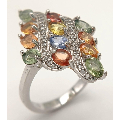 1182 - A Very Pretty Sterling Silver Muti-Gemstone Set Ring Size N. The Ring is set with Blue Topaz, Perido... 