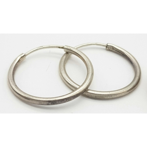 1228 - A collection of 3X pairs of 925 silver hoop earrings. Total weight 8.8G.