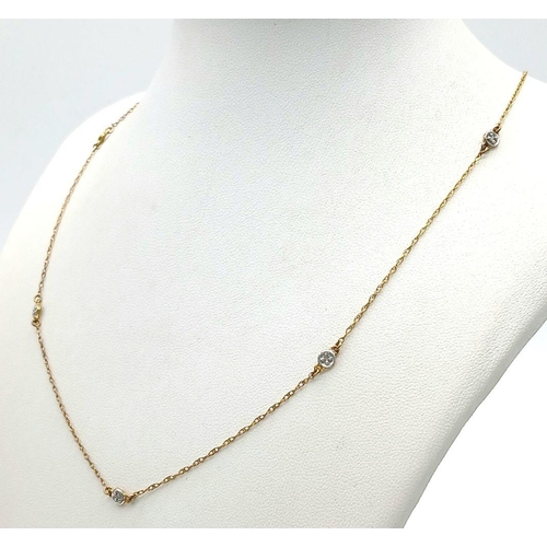 1257 - A gilt silver diamond chip necklace. 48.3cm in length, and 1.5g total weight.